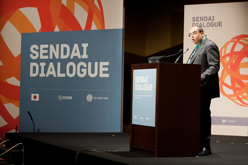 Speaker delivering a keynote at the Sendai Dialogue podium
